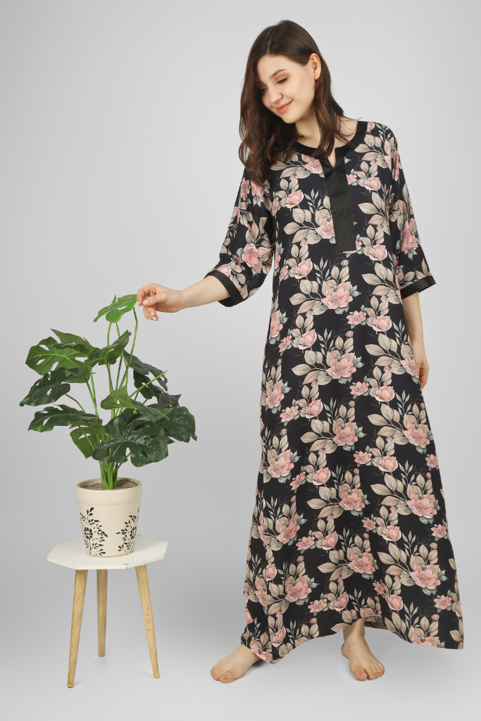 Black Blossom Breeze Nightgown: Floral pattern on black fabric. Relaxed fit for comfortable sleep and elegant style.